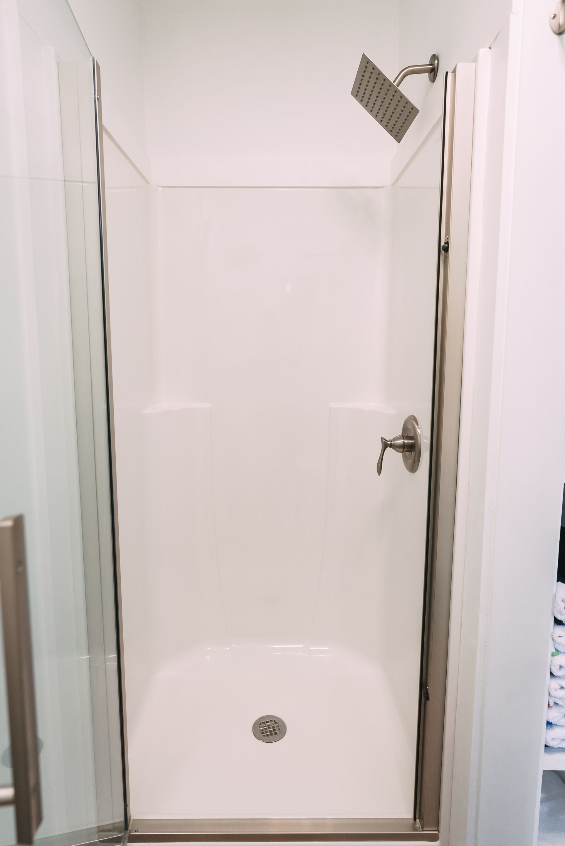 Shower, towels, soap, toilet paper