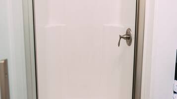 Shower, towels, soap, toilet paper
