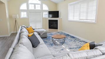Smart TV, fireplace, books