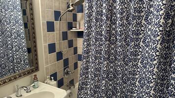 Jetted bath, hair dryer, towels, soap