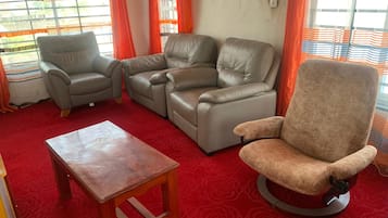 Comfort Apartment | Living area | Flat-screen TV