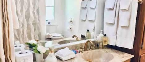 Hair dryer, towels, soap, shampoo