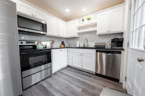 Fridge, microwave, oven, stovetop - Spacious 4BR/2BA Home - Closest Stay to OU Stadium & Campus (Norman)