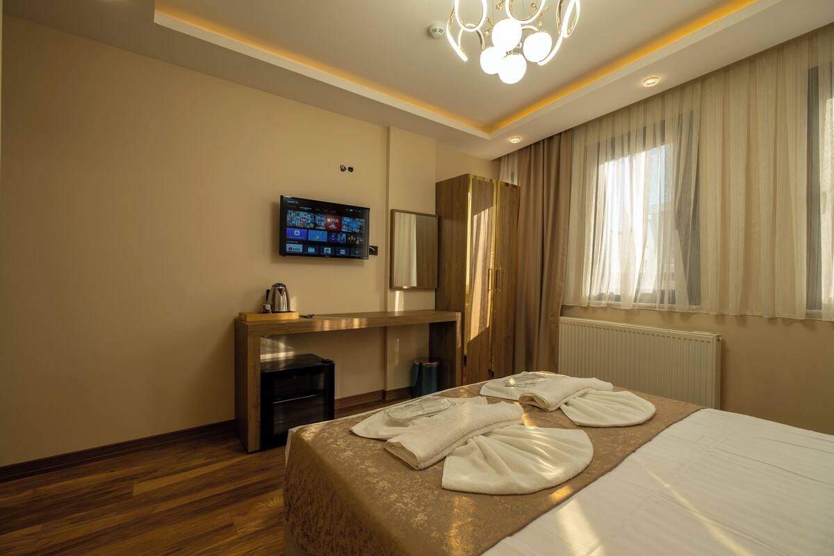Chambre Deluxe Double ou avec lits jumeaux, 1 lit double, non-fumeurs, vue ville | Literie de qualité supérieure, minibar, bureau