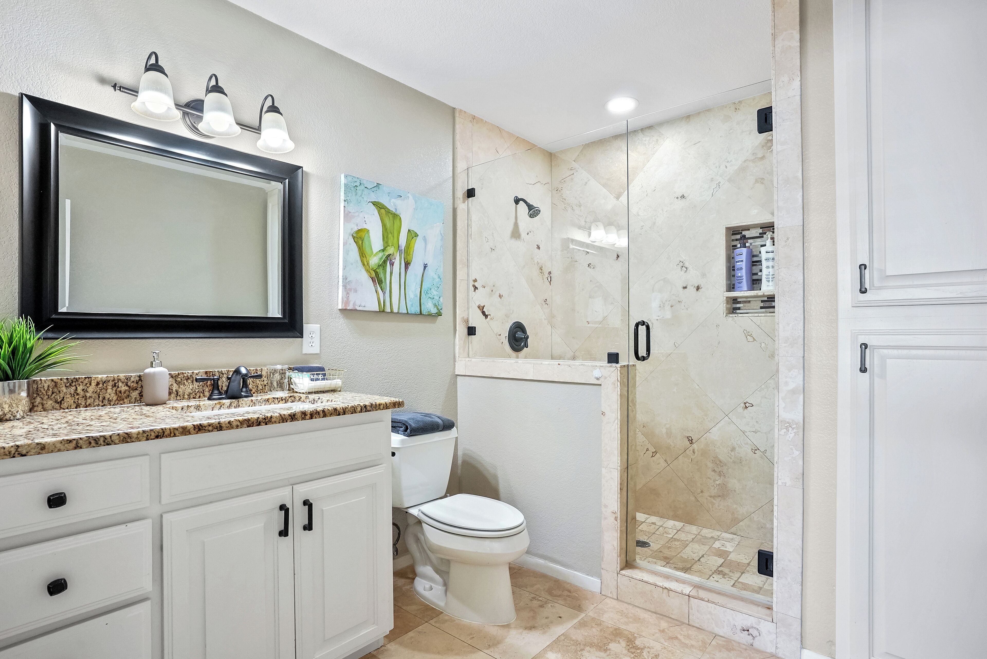 Shower, hair dryer, towels, soap