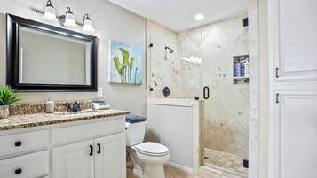 Shower, hair dryer, towels, soap