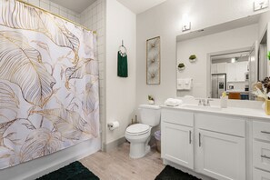Hair dryer, towels, soap, shampoo
