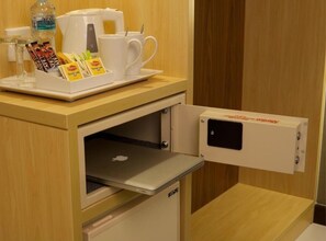 Convenient workspace and refreshments at your fingertips.