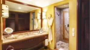Hair dryer, towels, shampoo, toilet paper