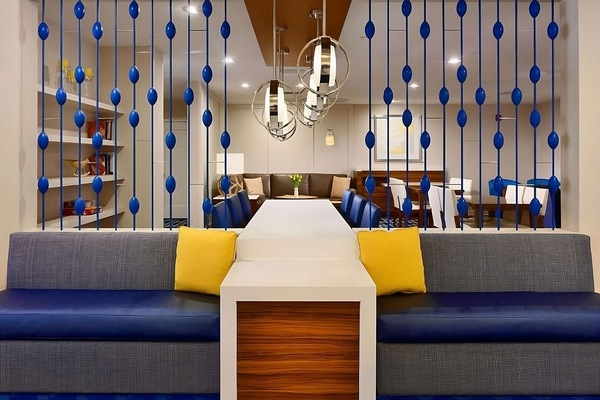 Relax together in a stylish lounge with cozy banquettes.