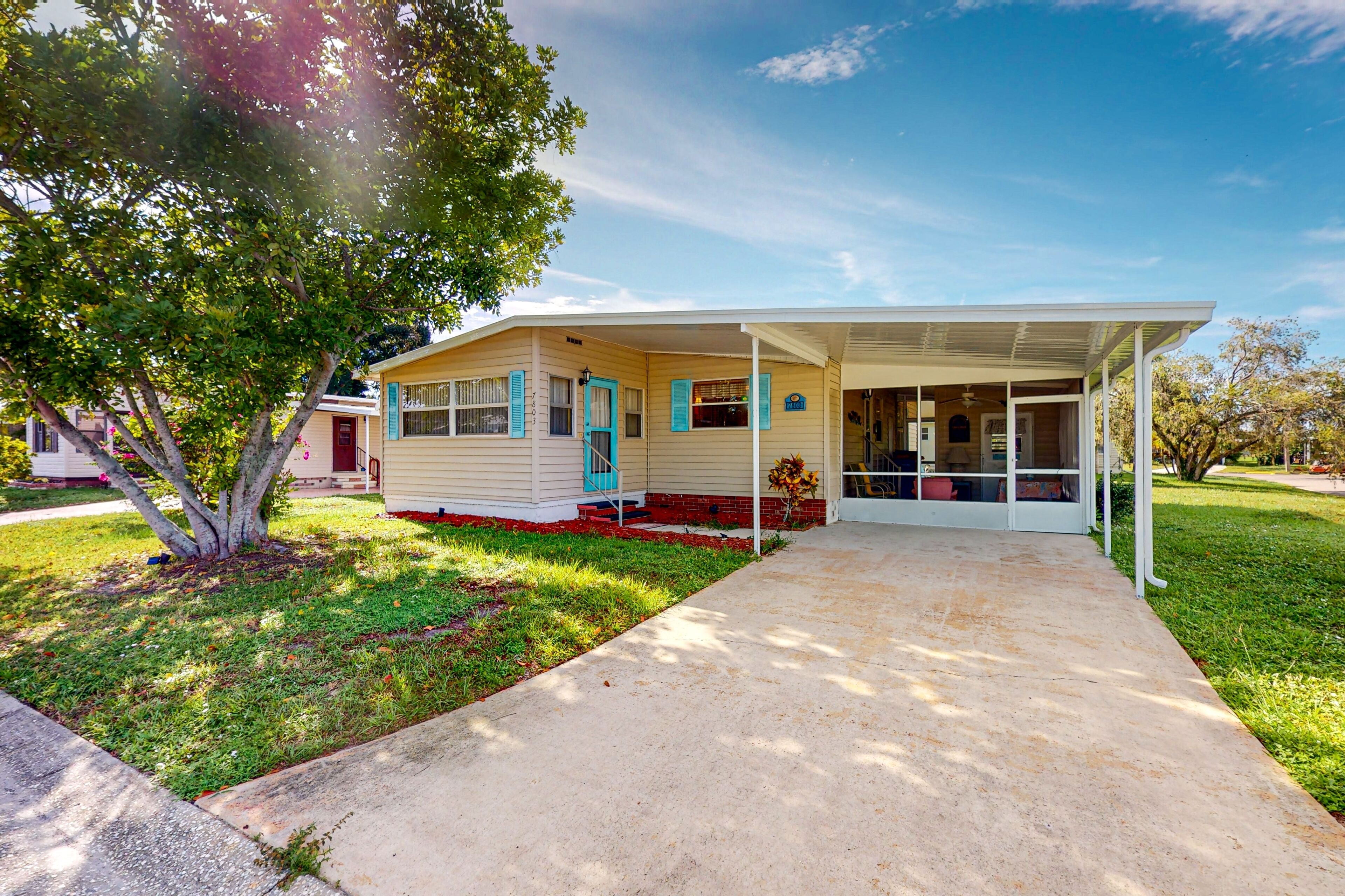 Private community home with on-site pool, screened patio, central AC, & W/D