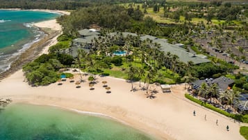 On the beach, sun loungers, beach towels