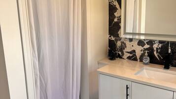 Hair dryer, towels, soap, toilet paper
