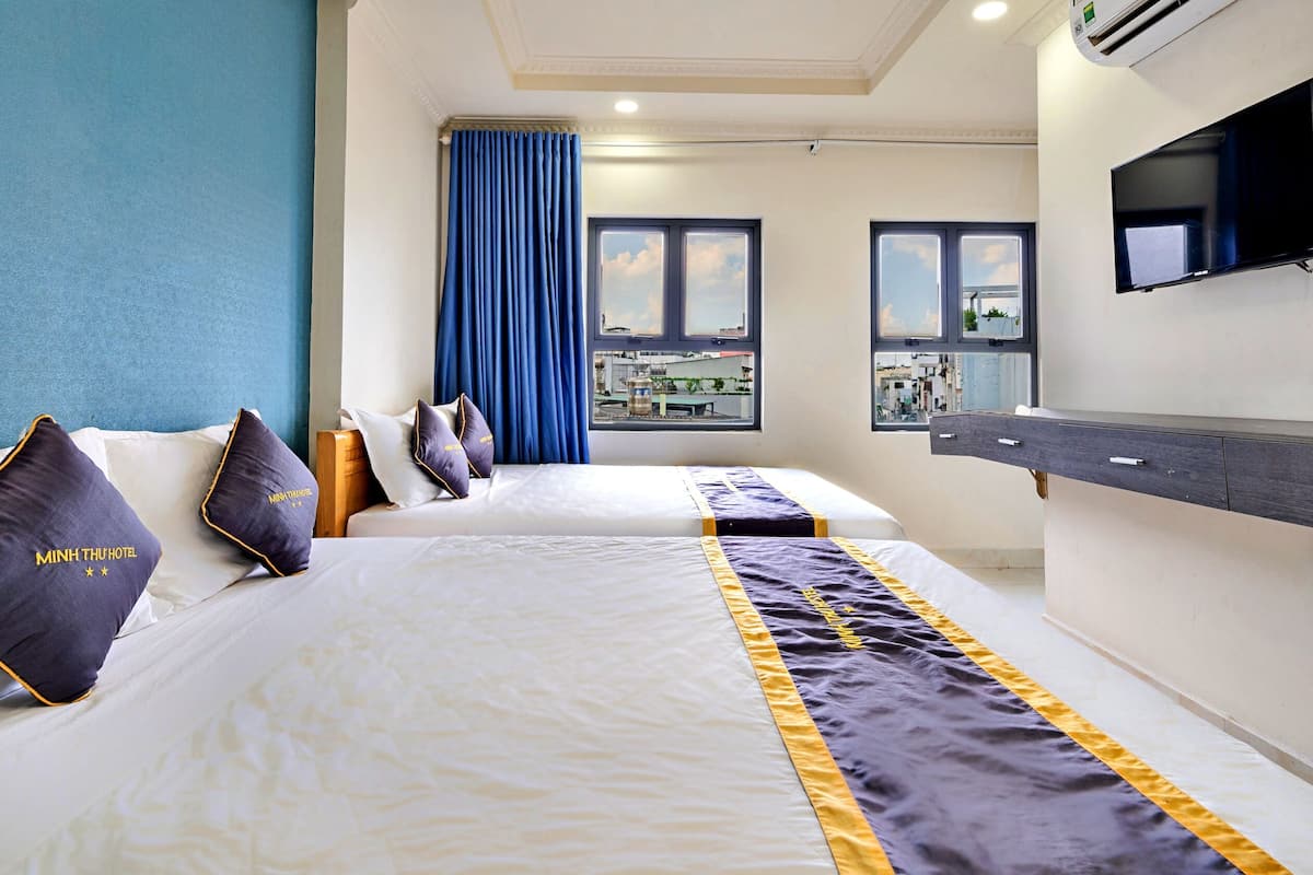 superior quadruple room | hypo-allergenic bedding, memory-foam beds, minibar