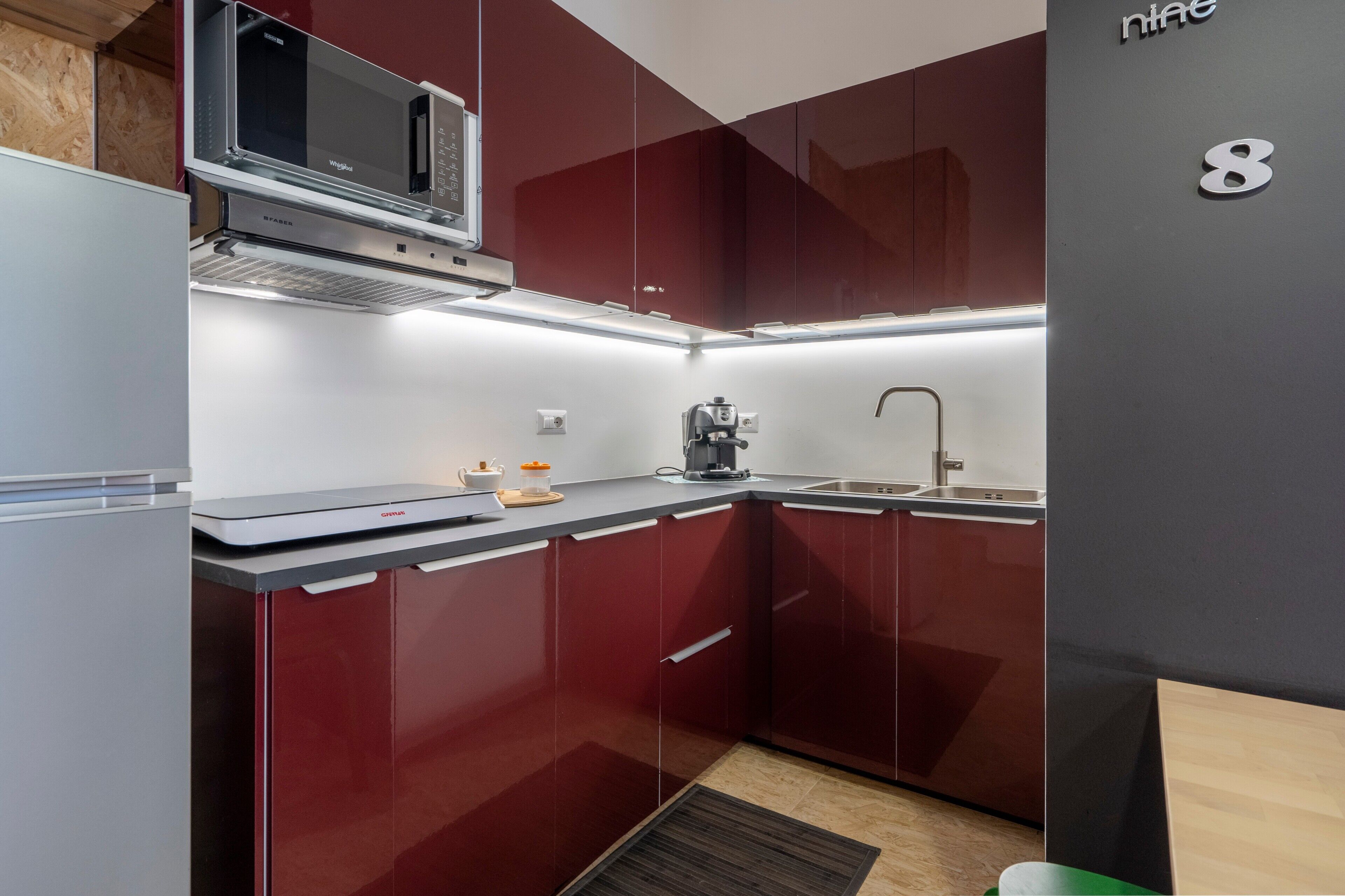 Fridge, microwave, stovetop, coffee/tea maker