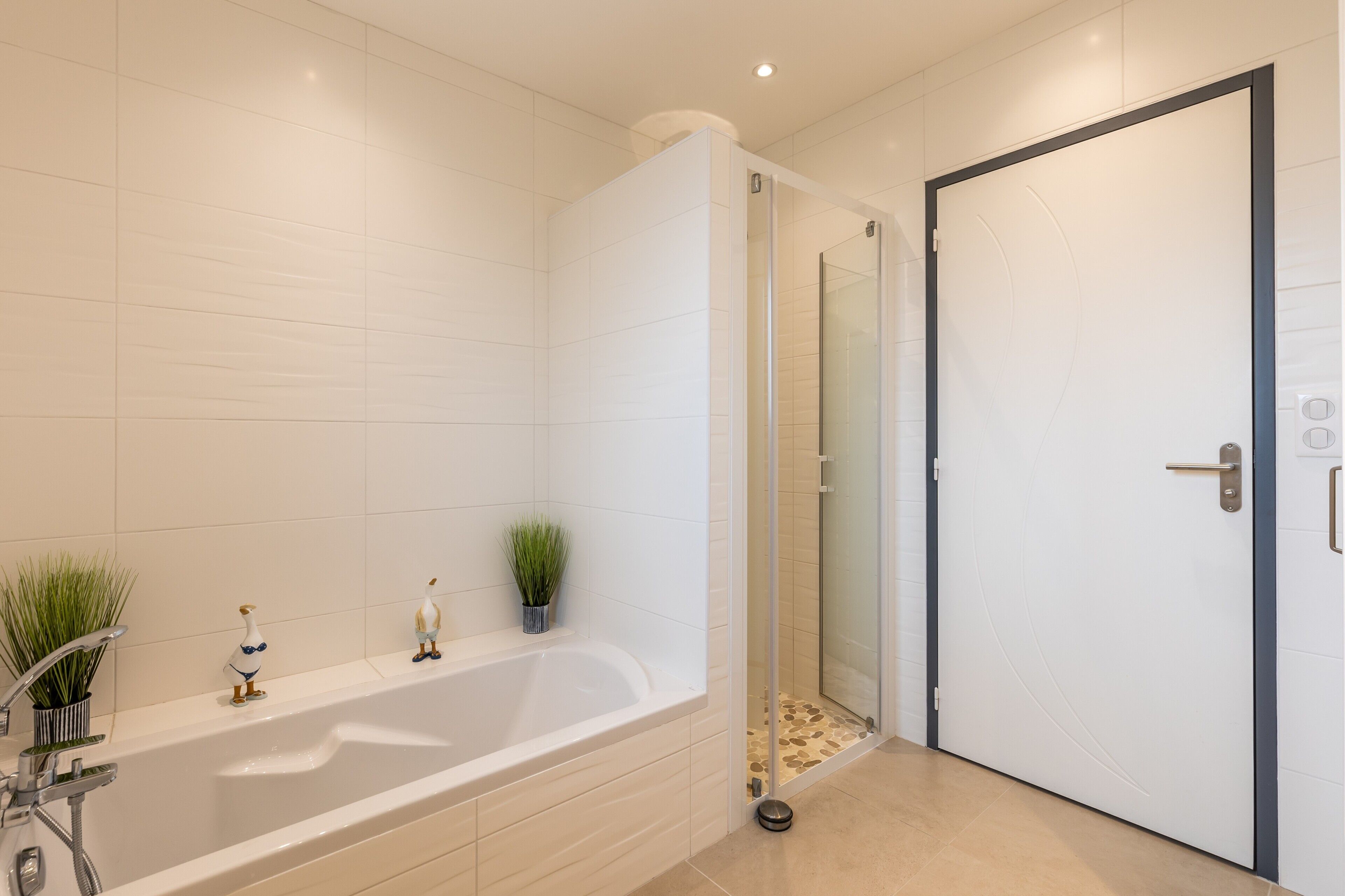 Bathtub, hair dryer, towels