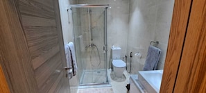 Shower, hair dryer, towels, soap