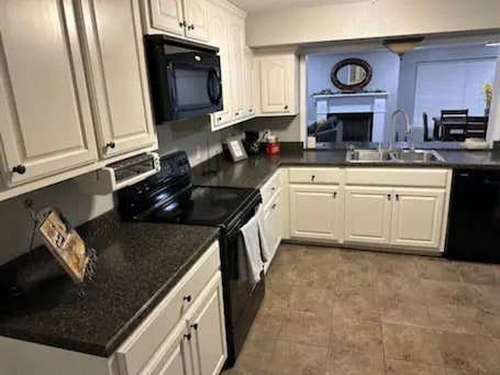 Fridge, microwave, oven, stovetop. Eli's Woodland Escape