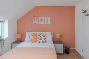 1 bedroom, desk, iron/ironing board, travel crib