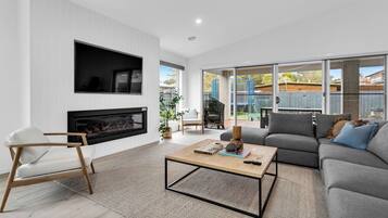 Smart TV, fireplace, table tennis, books