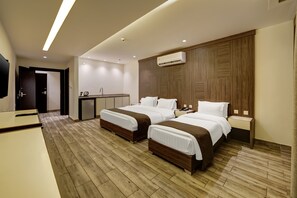 Family Suite, 2 Bedrooms | Desk, soundproofing, free WiFi - Luciana Hotel by FHM (Aqaba)