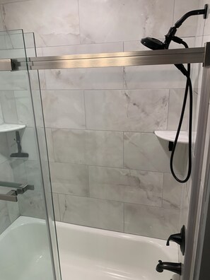 Shower, hair dryer, towels, soap