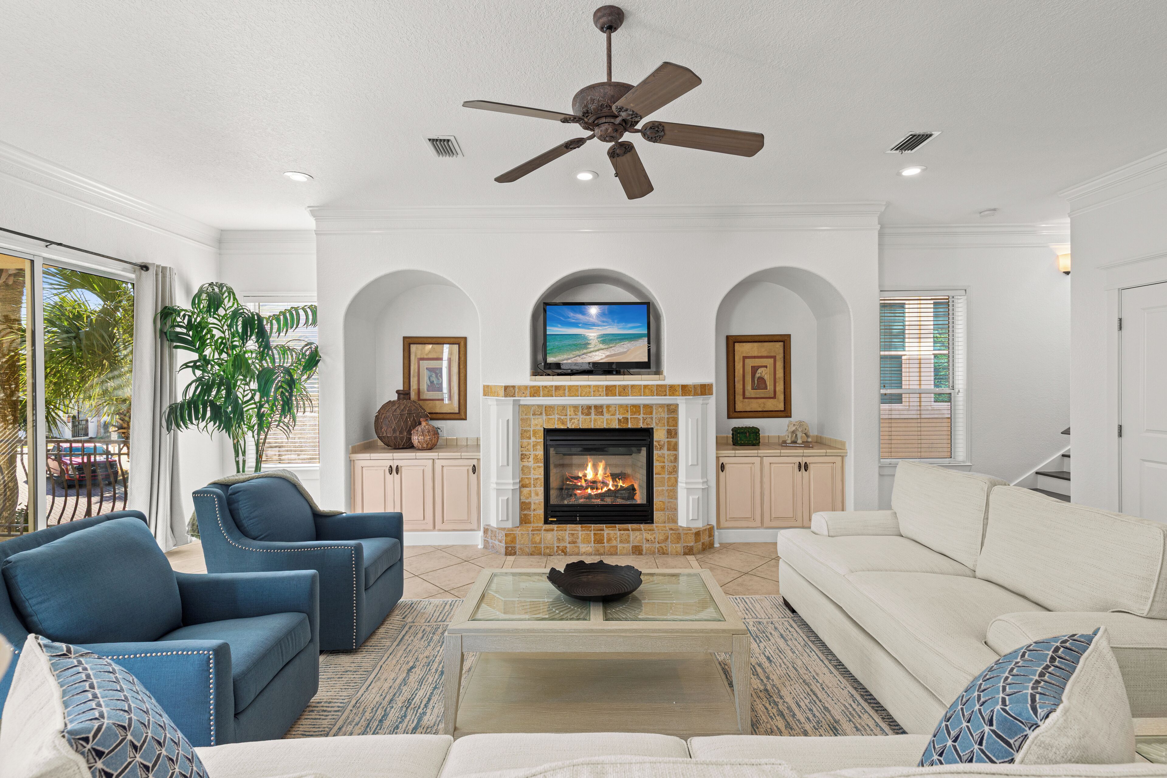 Smart TV, fireplace, books, offices