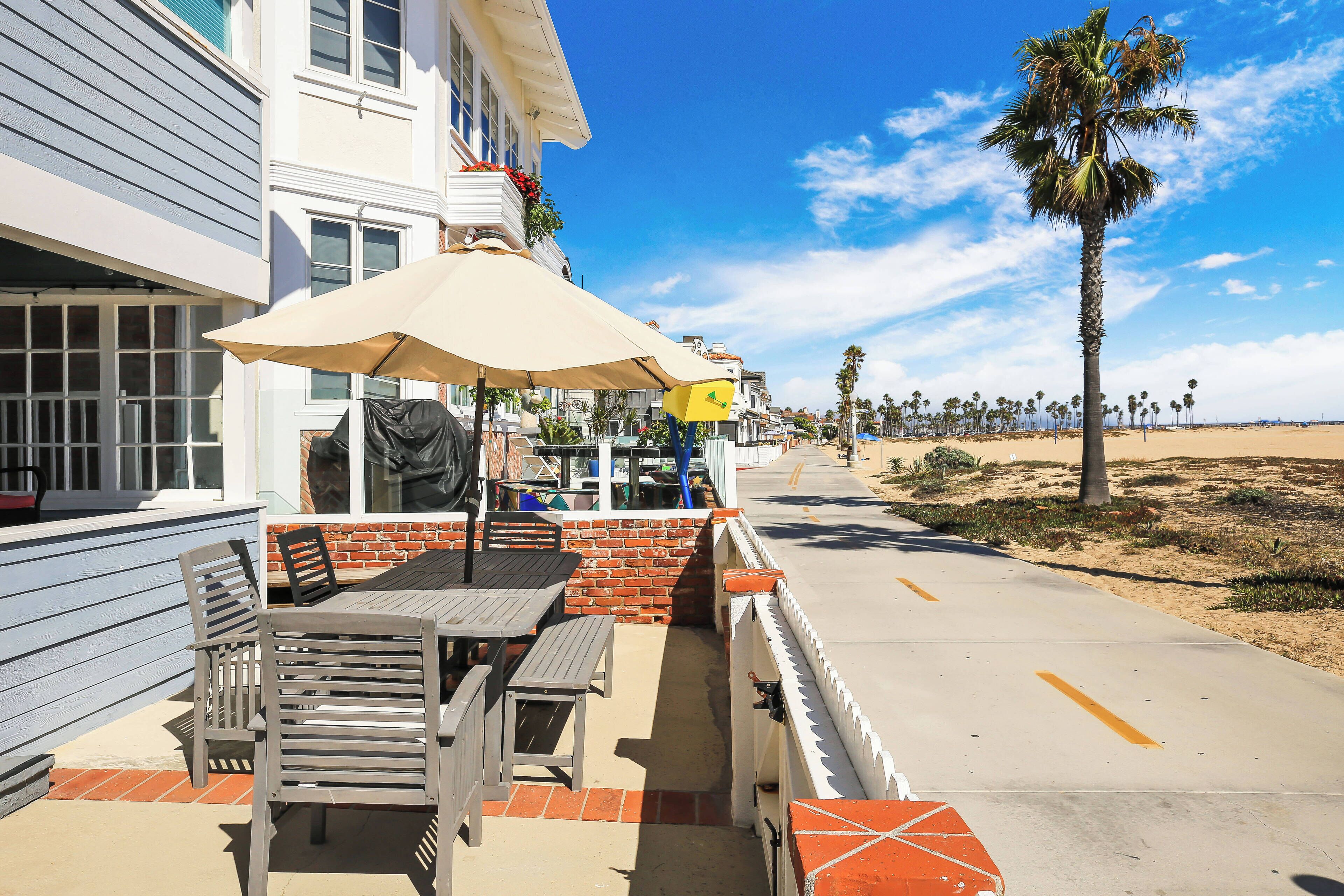 Stunning Beachfront Home in Prime Newport Location! Walk to Dining & Shopping