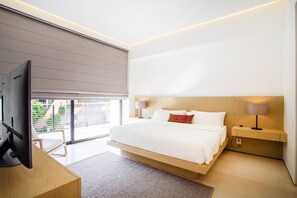 The bedroom features a comfortable king size bed, ensuite bathroom and smart TV