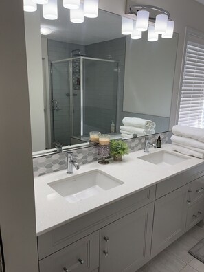 Hair dryer, towels, soap, toilet paper