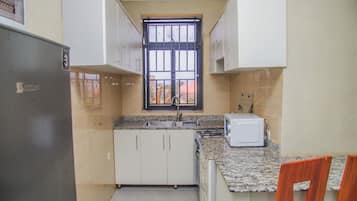 Business appartement, 2 slaapkamers, niet-roken, uitzicht op bergen | 1 slaapkamer, luxe beddengoed, donsdekens, een minibar