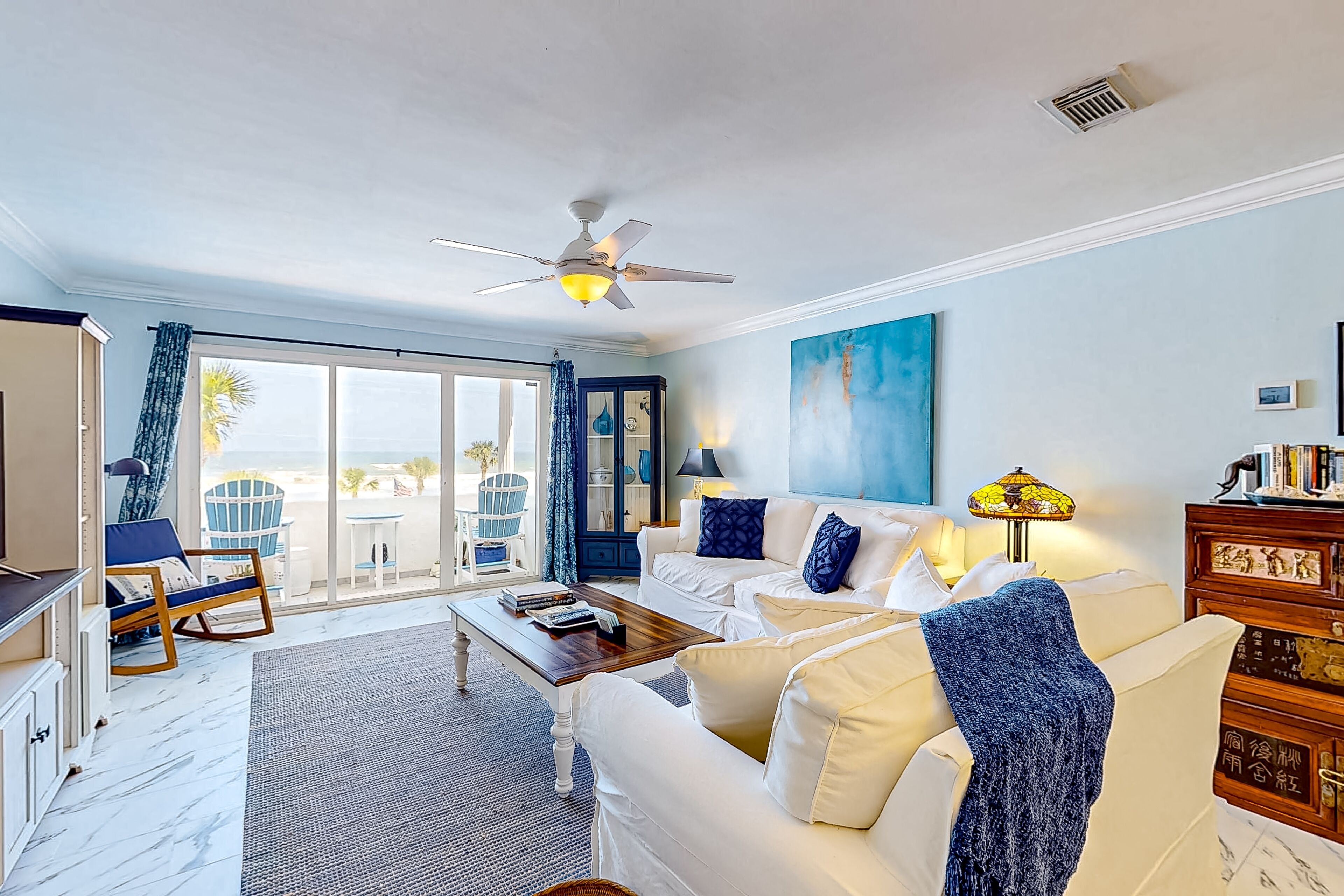 Updated oceanfront condo with pool-view balcony, full kitchen, and W/D access