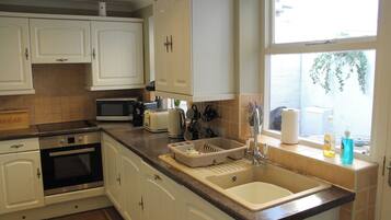 Fridge, dishwasher, electric kettle, toaster