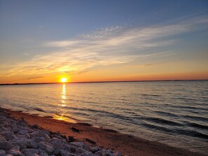 On the beach, sun-loungers, beach towels