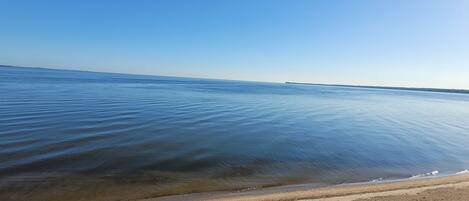 On the beach, sun-loungers, beach towels