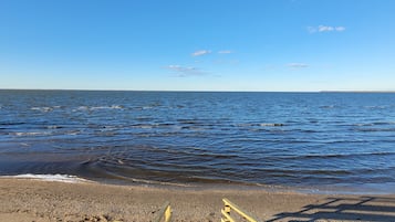 On the beach, sun loungers, beach towels