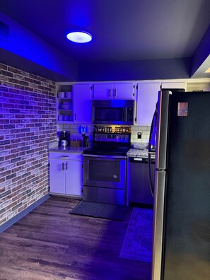 Fridge, stovetop, coffee/tea maker, electric kettle