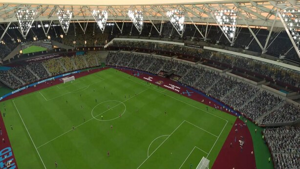 A stadium with multiple tiers of seating, a central field, and a roof structure. - London Flat Next to Central Line Tube Station (London)