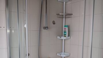 Shower, towels, soap, shampoo