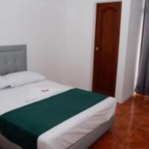 Elite Room | 1 bedroom, laptop workspace, free WiFi, bed sheets - Hotel La Martina (Apartadó)