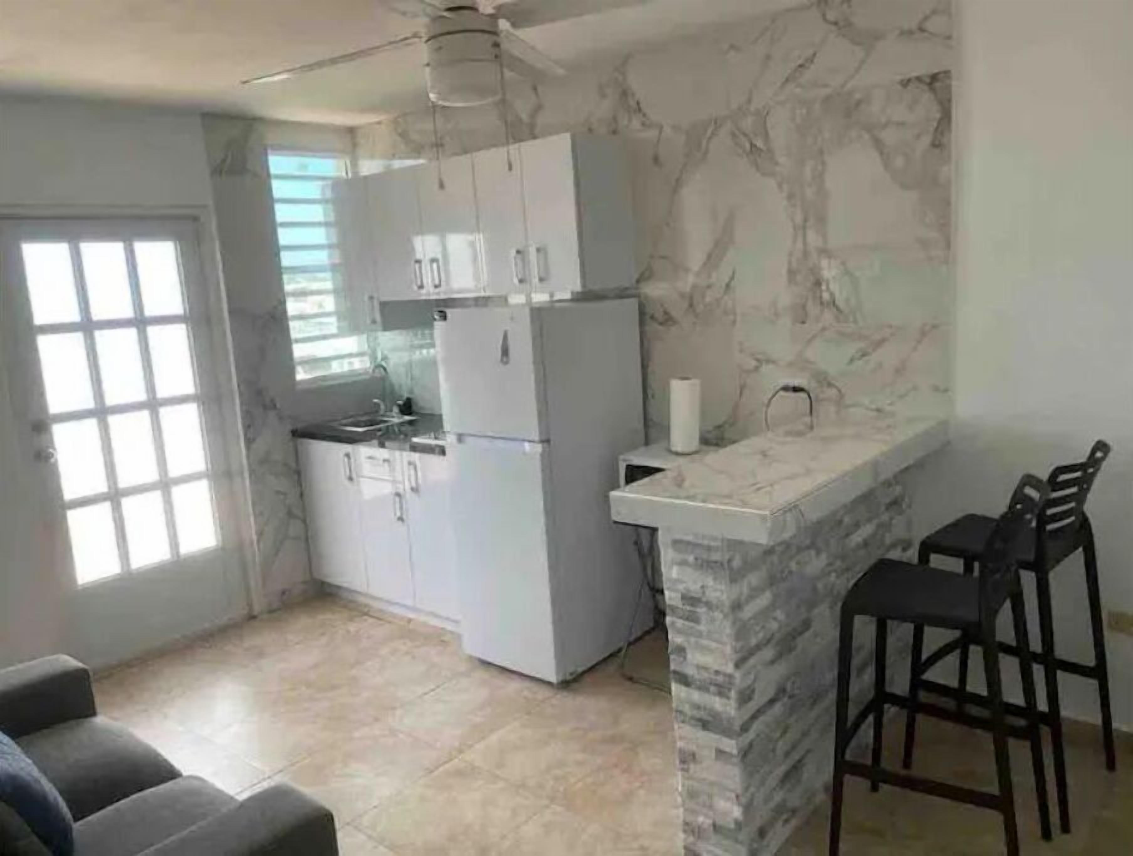 Fridge, microwave, coffee/tea maker, toaster