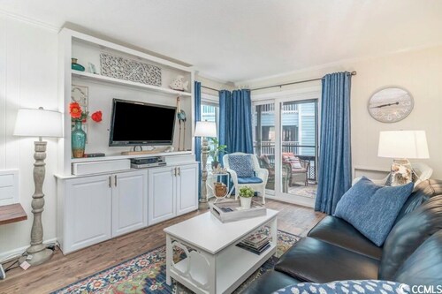 Beautifully relaxing condo on the ocean. Feet from the beach! Sea Oaks 108