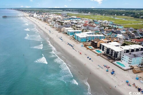 Beautifully relaxing condo on the ocean. Feet from the beach! Sea Oaks 108