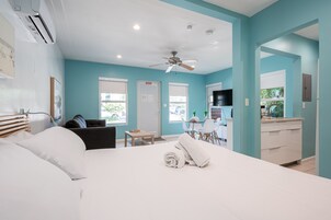 Classic Studio Suite | Living area | 50-inch flat-screen TV with cable channels