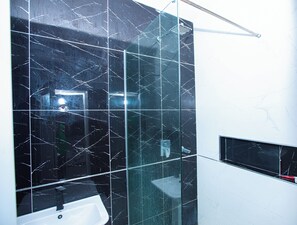 Shower, towels, soap, shampoo