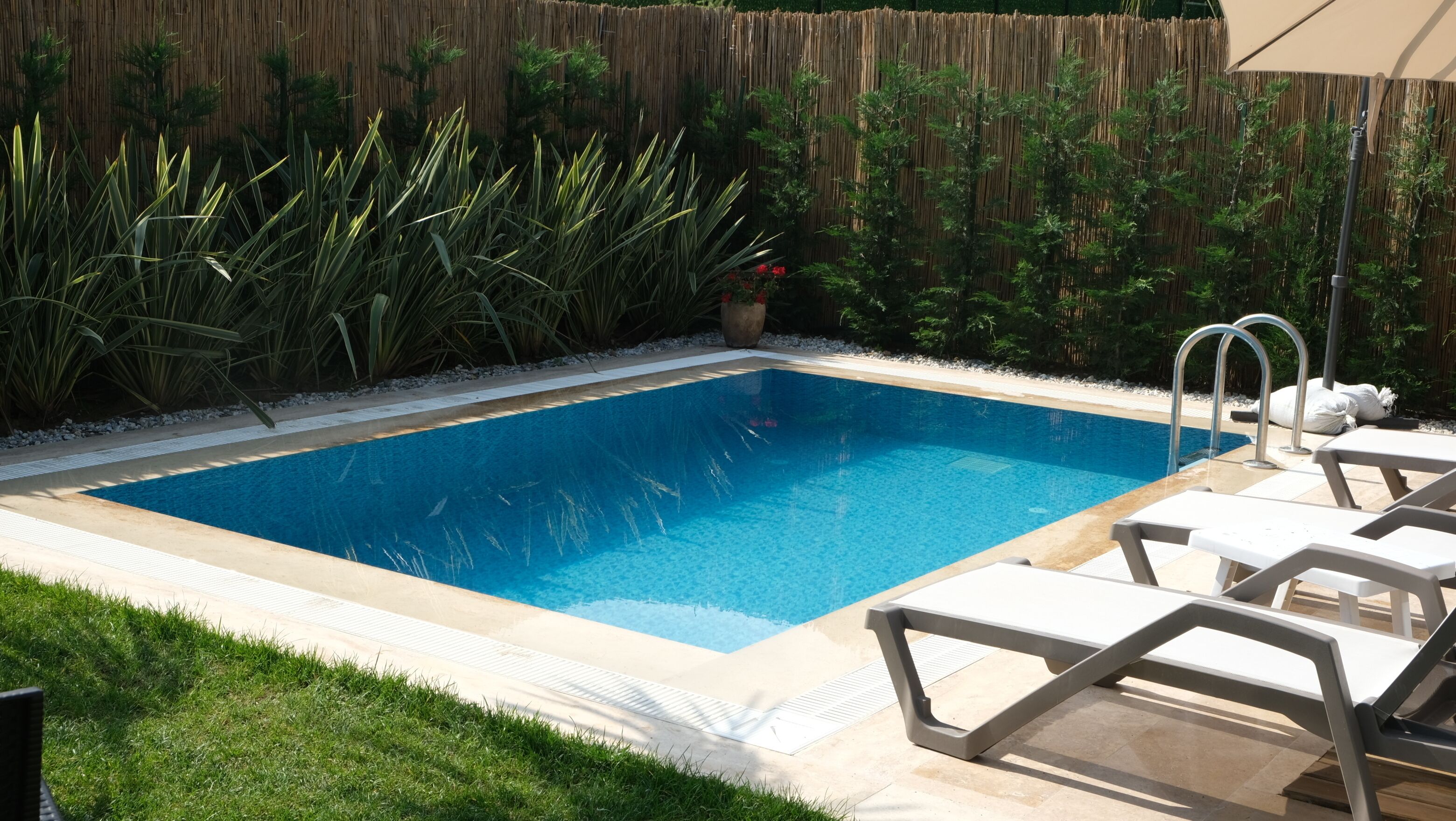 2 outdoor pools, pool umbrellas, sun loungers