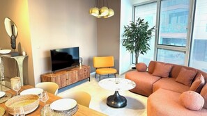 Apartment, 3 Bedrooms, Balcony | Living area | Smart TV, Netflix, streaming services - Gindi Tower APT - By Beach Apartments TLV  (Tel Aviv)