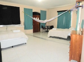 Family Room | Laptop workspace, free WiFi, bed sheets - Arnold's Guest House (San Ignacio)
