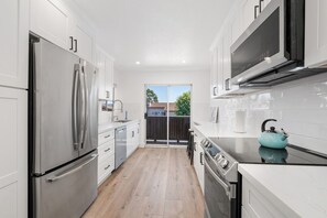 Fridge, microwave, oven, stovetop - Coastal NEWLY RENOVATED Condo in Dana Point. Walking distance to the Salt Creek! (Dana Point)