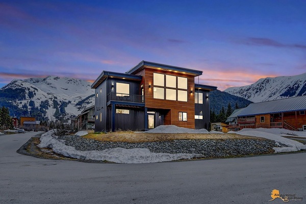Enjoy 270-degree mountain views in our modern Girdwood home